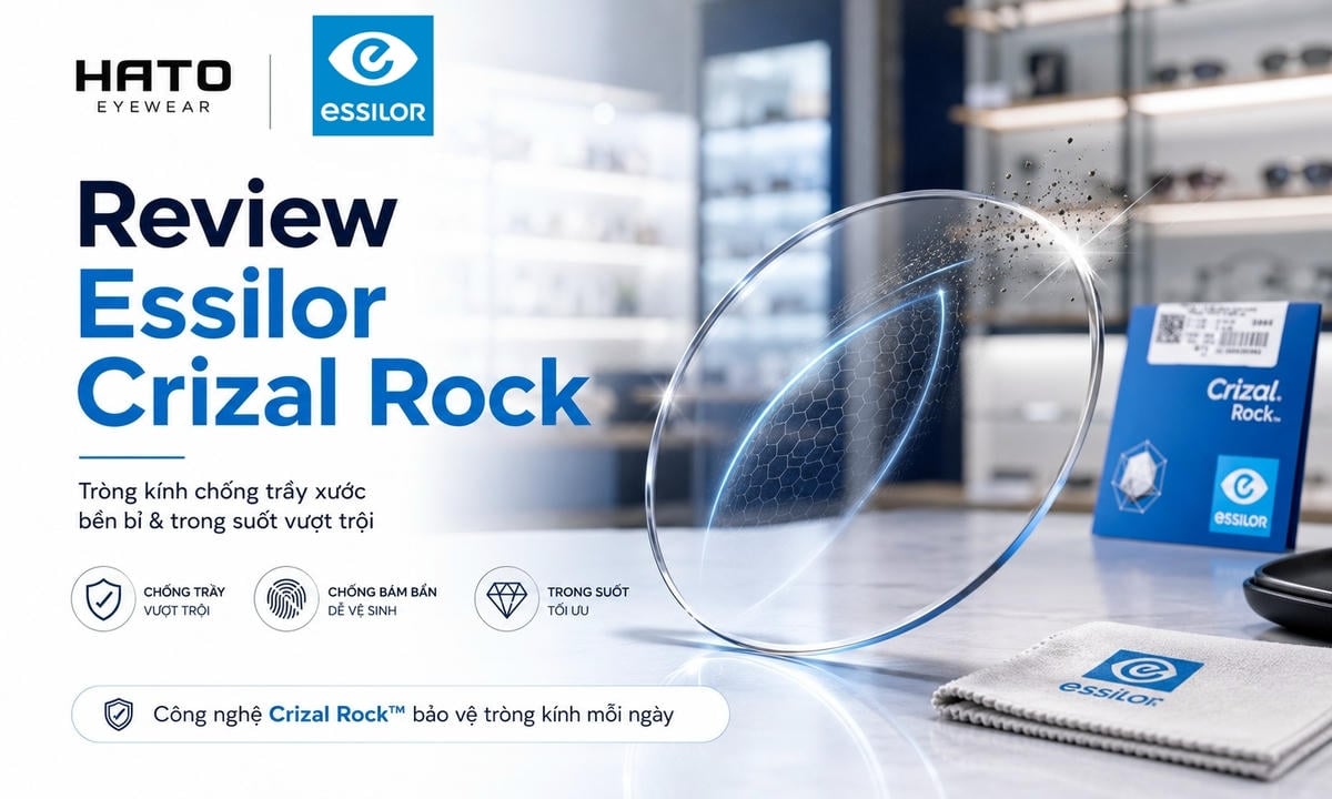 Ảnh đại diện blog review tròng kính Essilor Crizal Rock với thiết kế hiện đại, cận cảnh tròng kính trong suốt cao cấp, nhấn mạnh khả năng chống trầy xước, chống bám bẩn và dễ vệ sinh trong không gian cửa hàng mắt kính sang trọng.