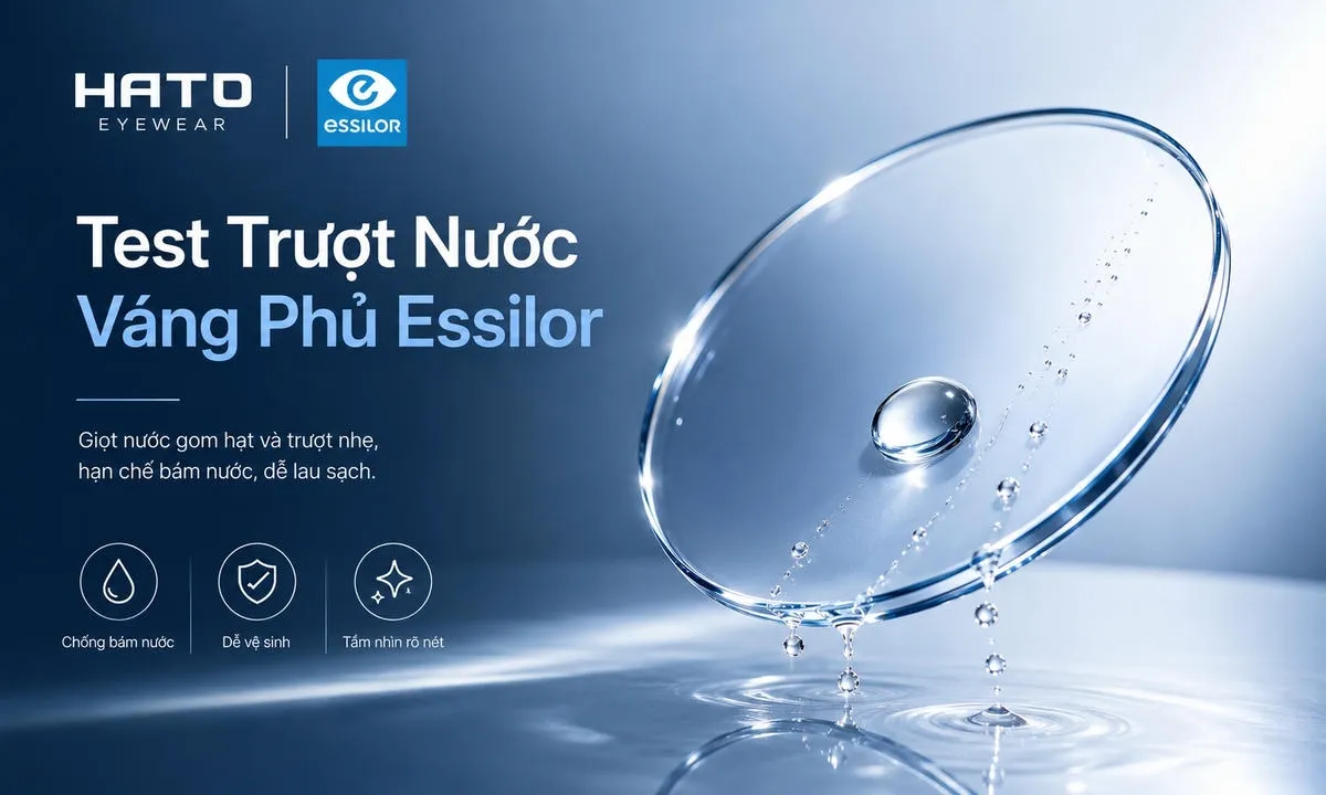 Ảnh minh họa test trượt nước trên tròng kính Essilor cao cấp với giọt nước gom thành hạt tròn và trượt nhẹ trên bề mặt, thể hiện lớp phủ chống bám nước.