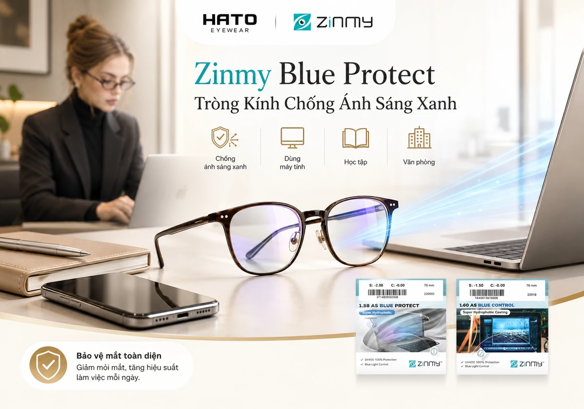 Ảnh blog giới thiệu Zinmy Blue Protect tại Hato Eyewear với phong cách văn phòng hiện đại, sáng sạch và chuyên nghiệp. Hình ảnh nổi bật cặp kính lắp tròng trong suốt có phản quang xanh tím nhẹ, thể hiện khả năng hỗ trợ lọc ánh sáng xanh từ màn hình, phù hợp cho học tập, làm việc với máy tính và sử dụng hằng ngày trong môi trường văn phòng.