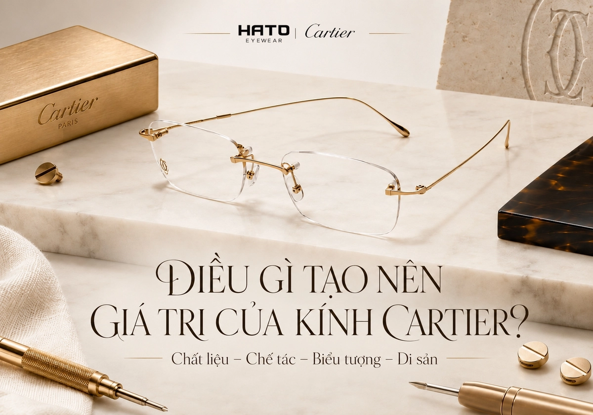 Kính Cartier không gọng màu vàng đặt trên bệ đá cẩm thạch, minh họa các yếu tố tạo nên giá trị của kính Cartier chính hãng như chất liệu cao cấp, kỹ nghệ chế tác, thiết kế biểu tượng và di sản thương hiệu.