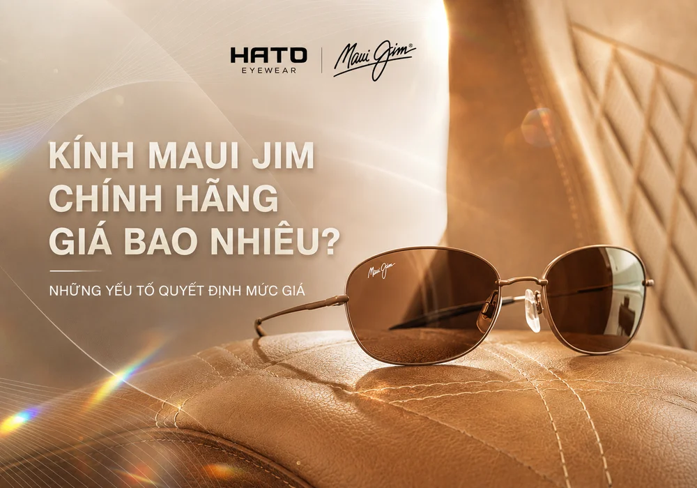 Kính Maui Jim chính hãng gọng kim loại tròng nâu trên nền da cao cấp.