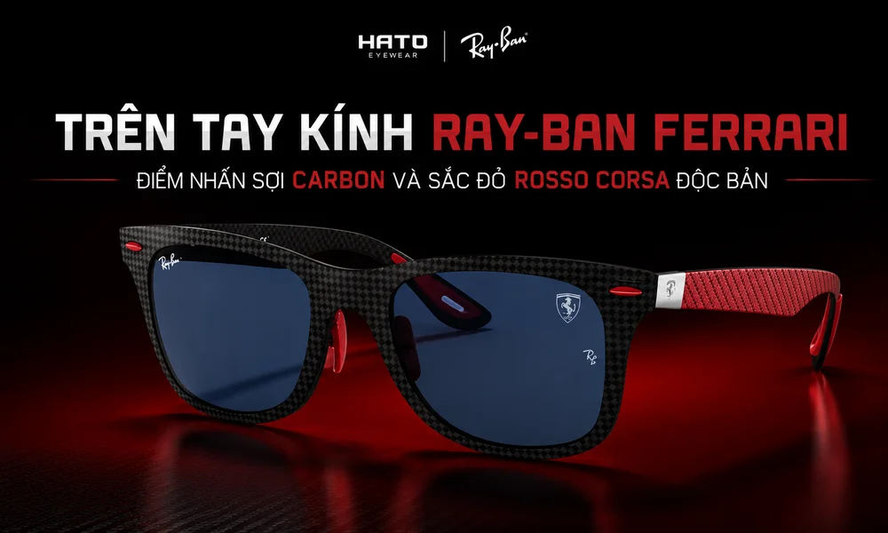 Kính Ray-Ban Ferrari với họa tiết sợi carbon, tròng xanh đậm và điểm nhấn đỏ Rosso Corsa độc bản tại Hato Eyewear.