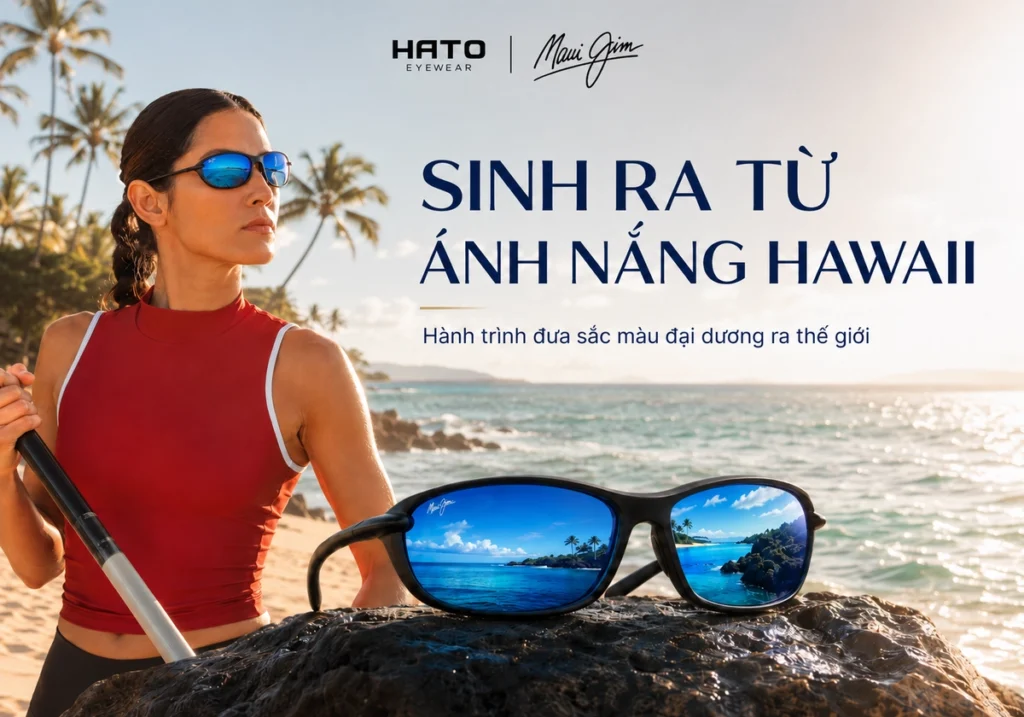Người phụ nữ đeo kính Maui Jim tròng xanh bên bờ biển Hawaii cùng kính mát đặt trên đá núi lửa.