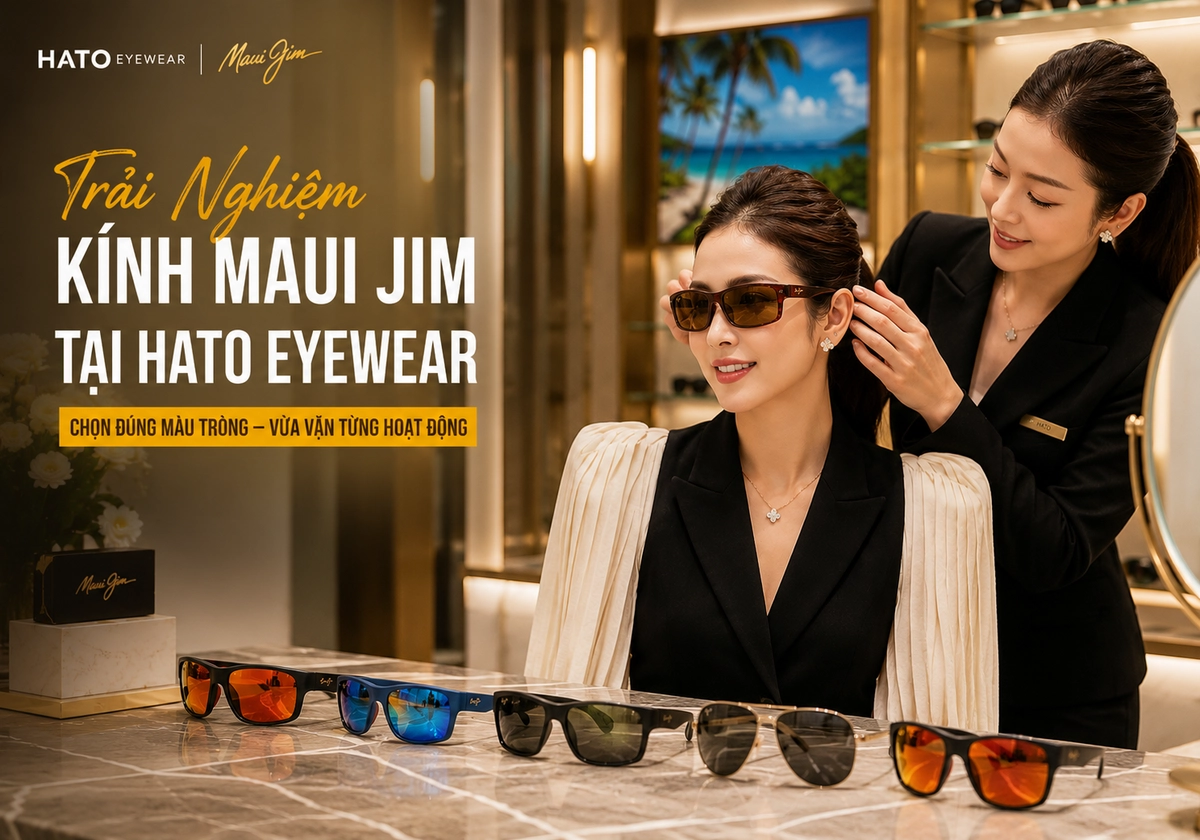Khách hàng thử kính mát Maui Jim tại showroom Hato Eyewear với sự hỗ trợ của chuyên viên tư vấn chọn màu tròng và điều chỉnh độ vừa vặn.