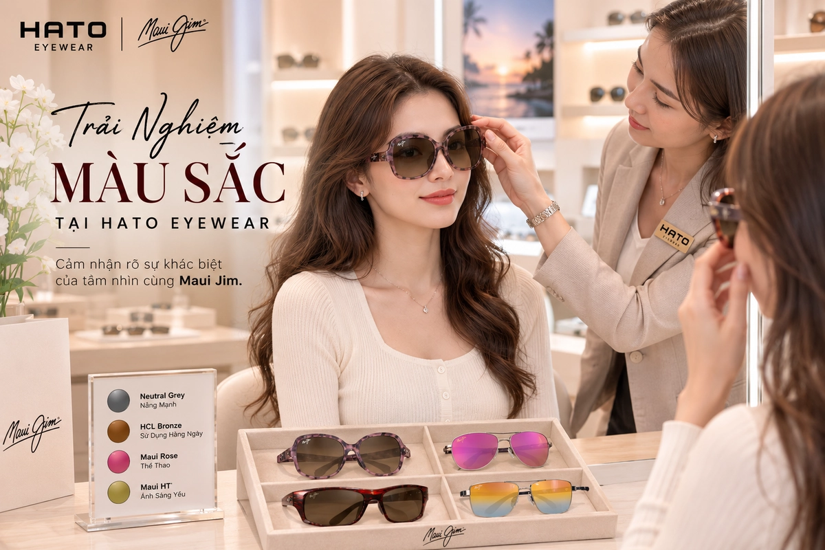 Khách hàng thử kính mát Maui Jim và được chuyên viên Hato Eyewear tư vấn độ vừa vặn, màu tròng và kiểu dáng phù hợp trong showroom cao cấp.