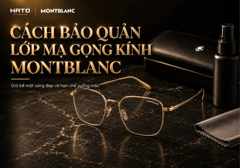 Cách bảo quản gọng kính Montblanc kim loại màu vàng trên bàn đá tối cùng khăn microfiber, hộp kính và dung dịch vệ sinh, minh họa cách bảo quản lớp mạ.