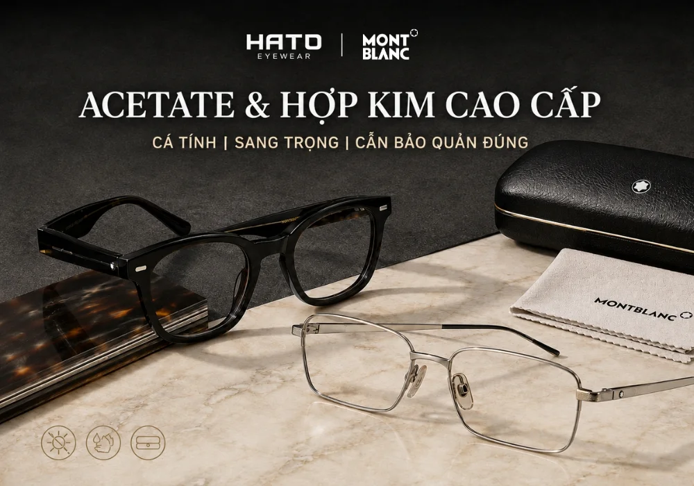 So sánh gọng kính Montblanc acetate đen và gọng hợp kim cao cấp trên mặt bàn đá sang trọng.